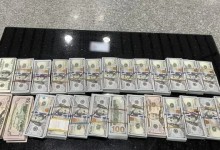 女子手提袋装25万美元出境被查 折合人民币约180万元-融党建互动平台